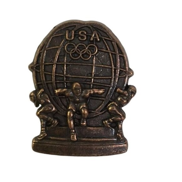 Vintage Bronze USA Olympics Pin Athletes Holding up the Globe - Picture 1 of 3